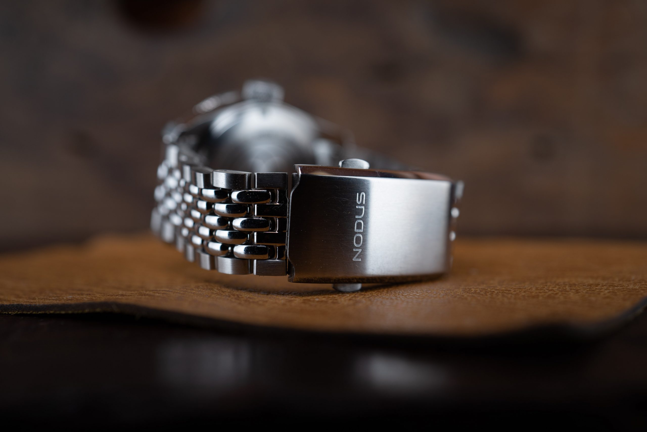 Shot of the Nodus Sector 100 dive watch beads-of-rice bracelet and clasp.